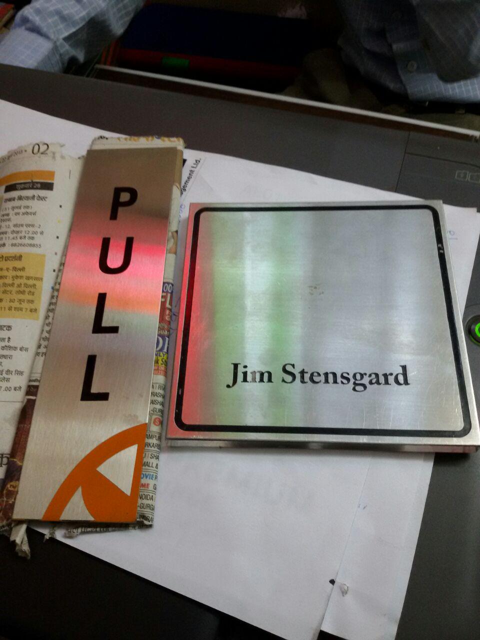 SS CORPRATE NAME PLATES-AMPLE GRAPHICS 