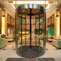 Bend Glass Revolving Door