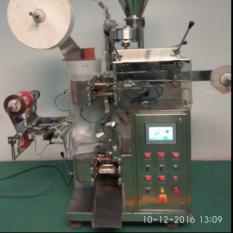 Tea bag machine with outer pouch